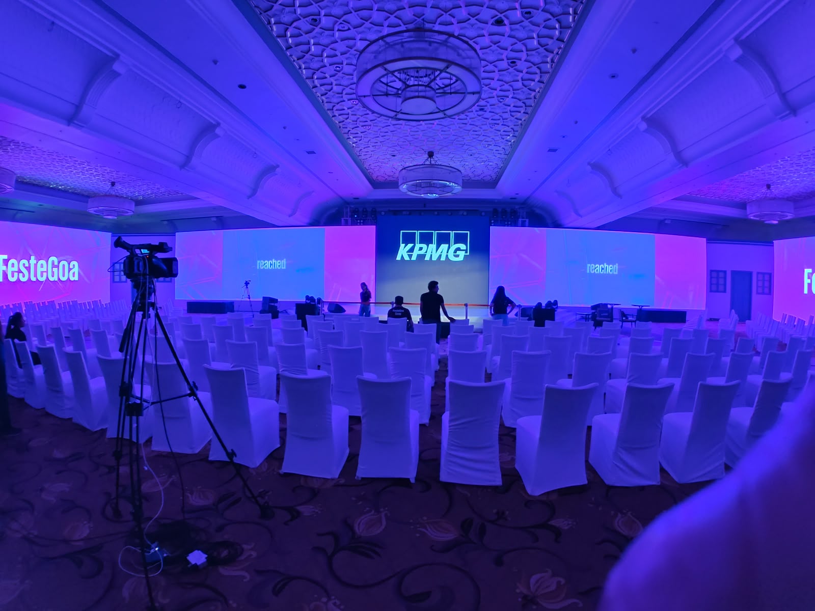 KPMG Feste Goa ballroom set with wide LED wall in blue and pink lighting