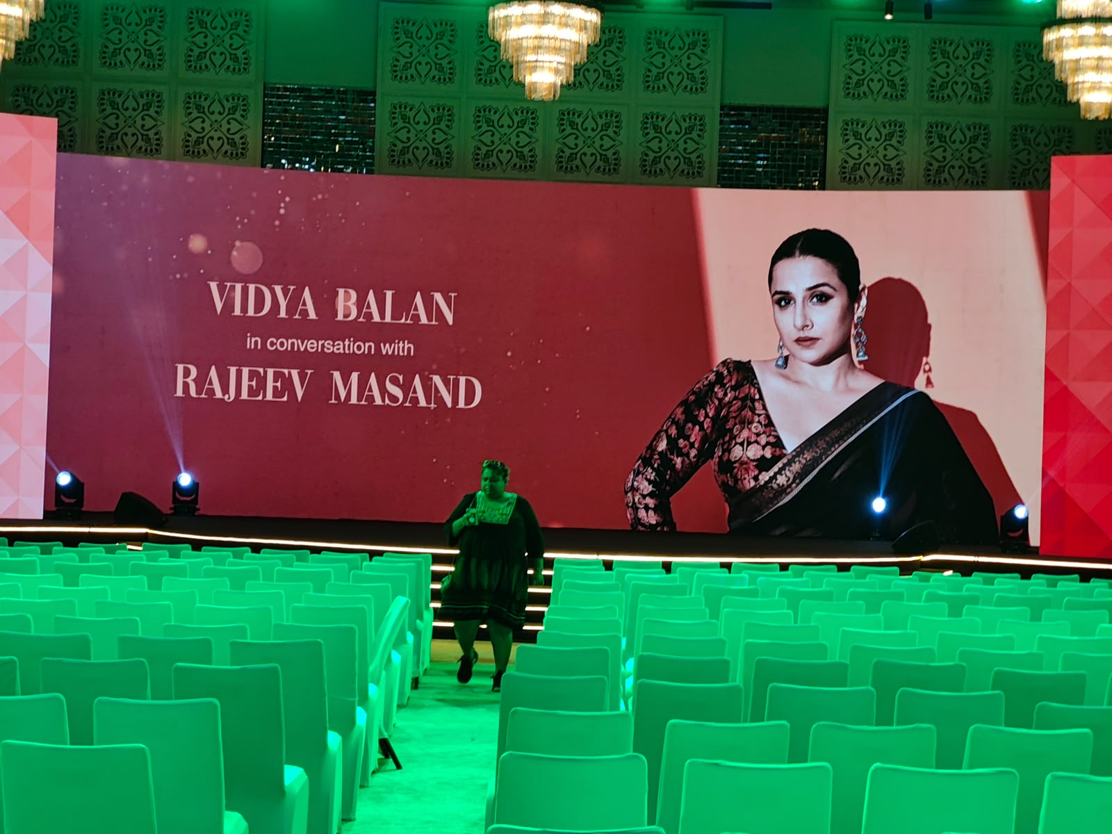 Vidya Balan in conversation with Rajeev Masand stage set with LED portrait backdrop