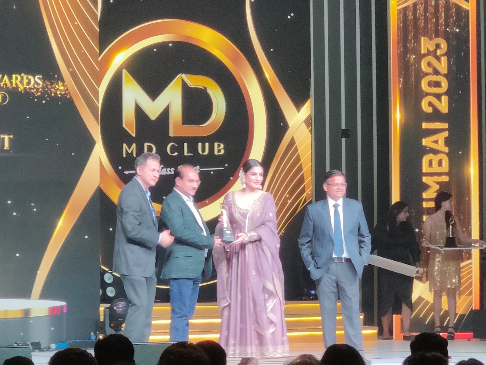 MD Club Mumbai 2023 awards night with Raveena Tandon on stage with executives
