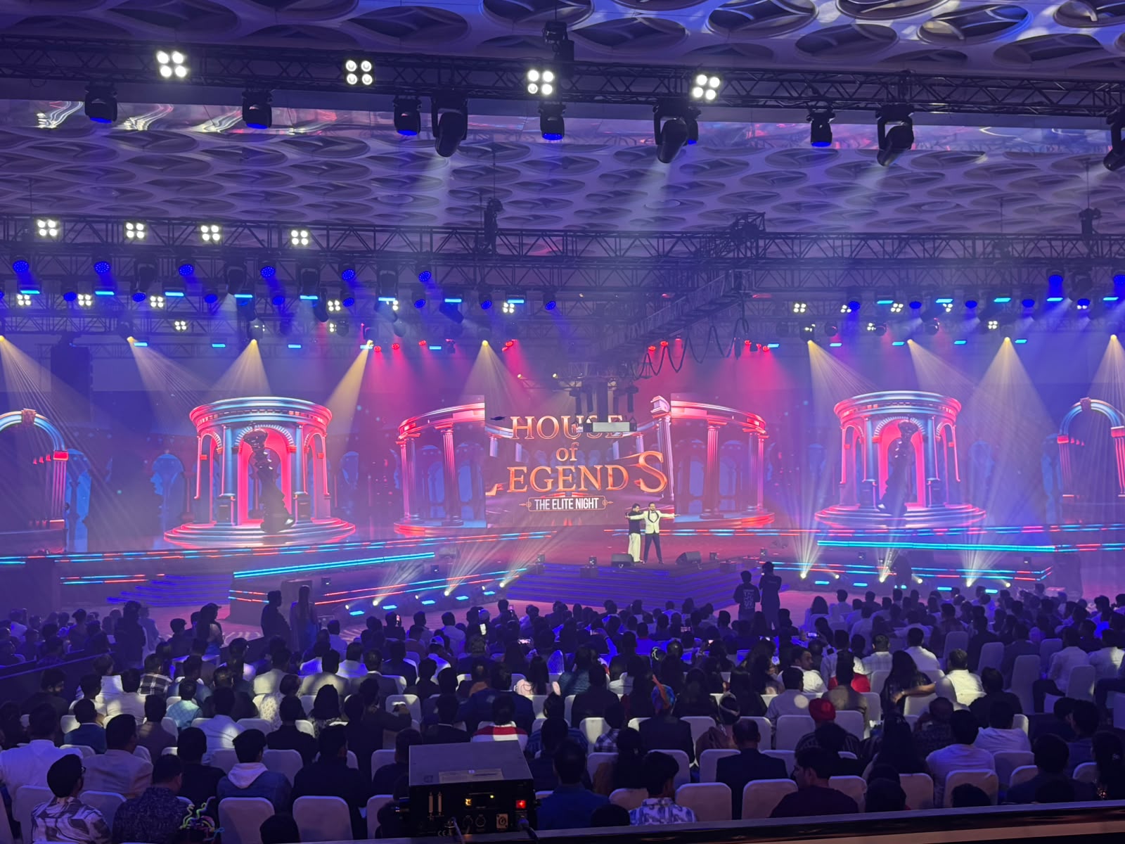 Asian Paints House of Legends Elite Night stage with pillared LED set, blue and red lighting and packed ballroom